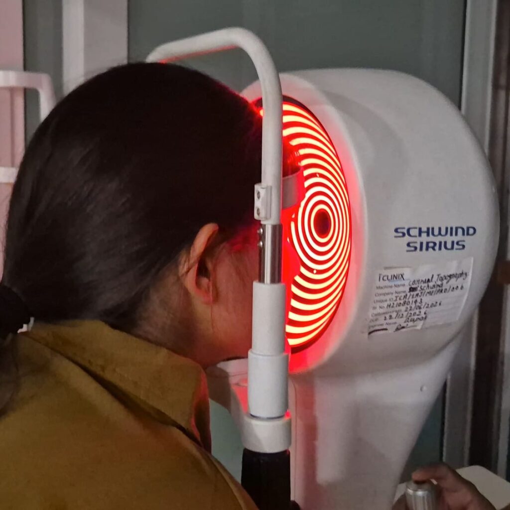 Patient at the Schwind Sirius corneal topographer