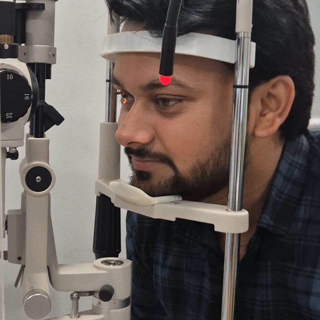 Patient at the slit lamp during an eye examination