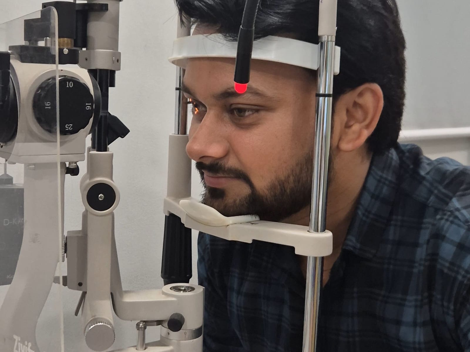 Patient at the slit lamp during an eye examination